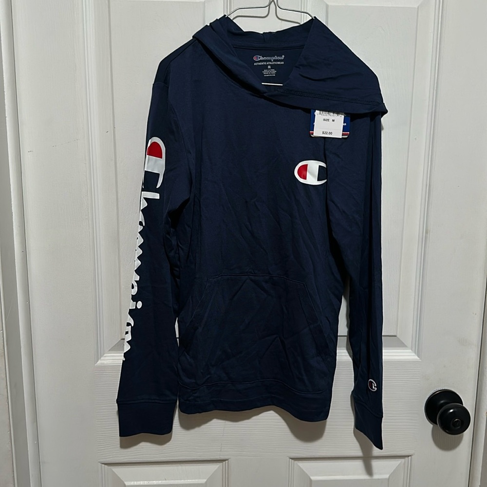 Boys long sleeve hooded shirt.